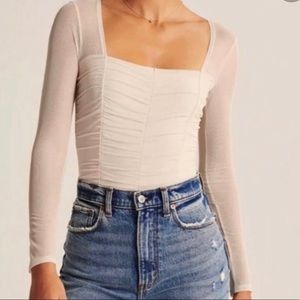 Cute white body suite from Abercrombie size XS, great condition